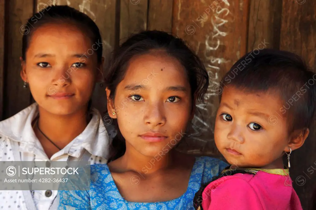 Nepal, Gorkha , Arket Bazaar. Three Nepalese girls.