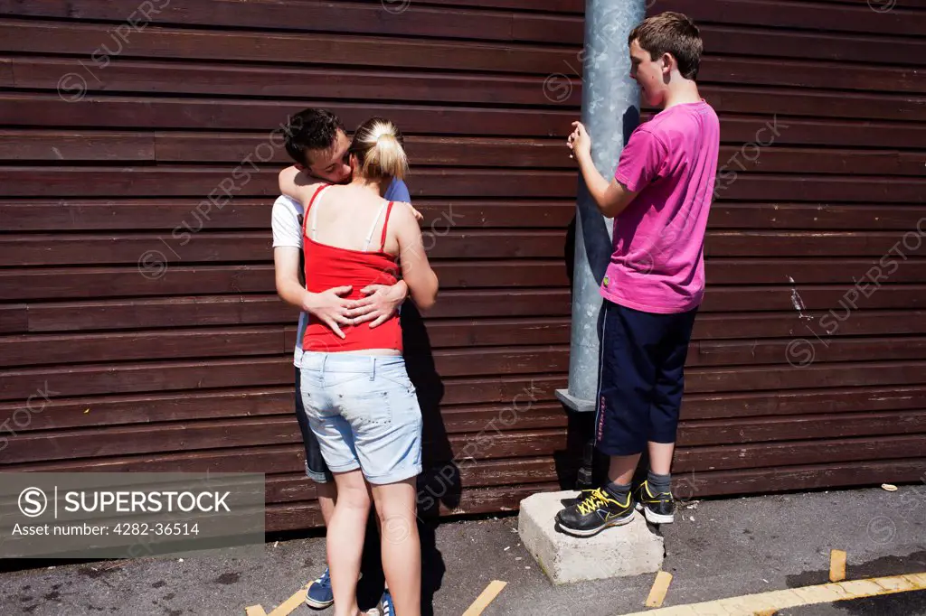 England, Bristol, Bristol. Teenagers in the street.