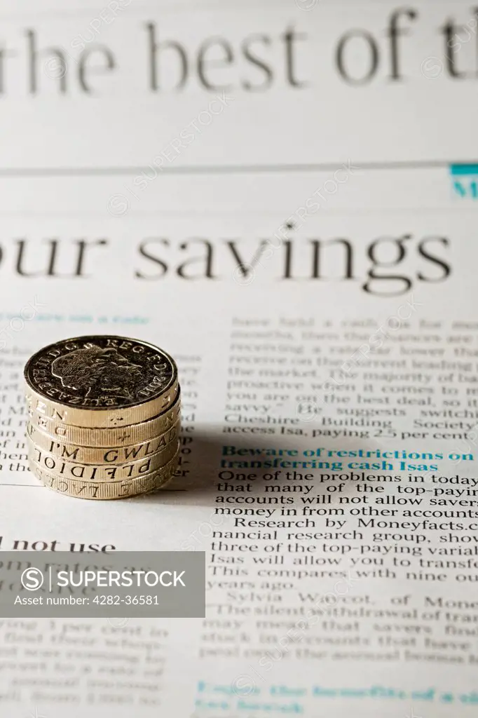 England, North Yorkshire, York. English pound coins on a page of financial newspaper.