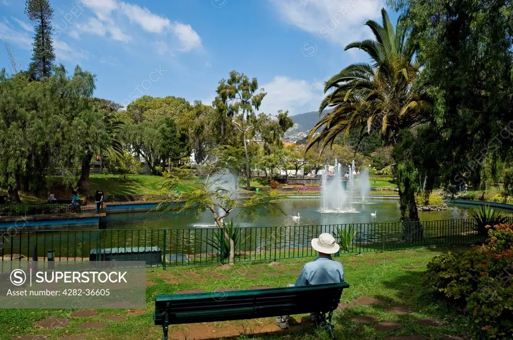 Portugal, Madeira, Funchal. Looking across the lake at Santa Catarina Park.