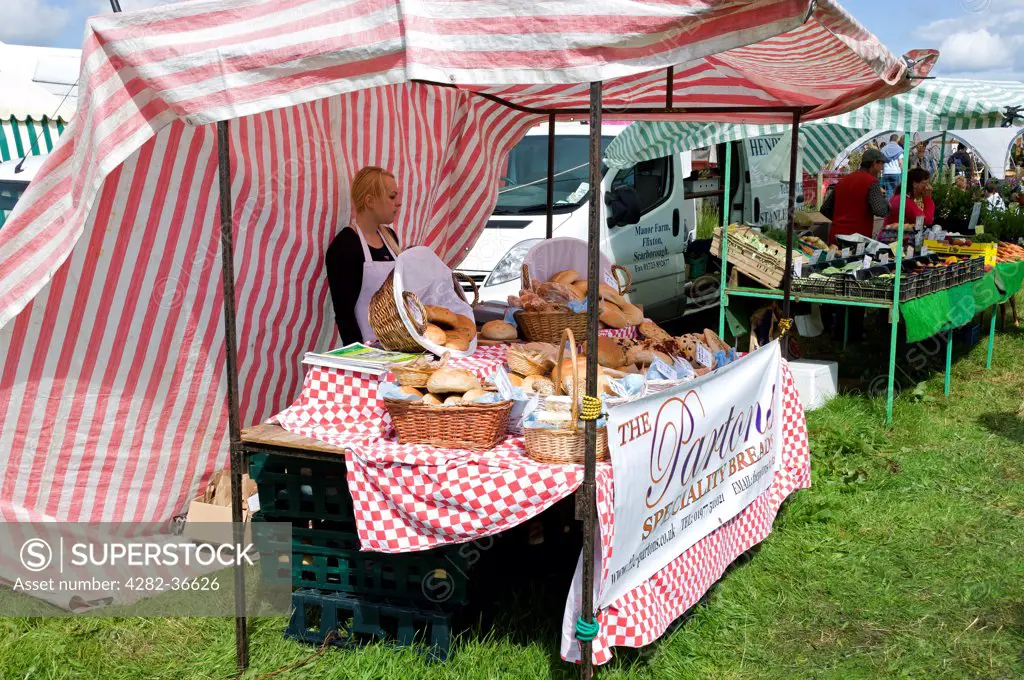 England, North Yorkshire, Egton. Speciality bread stand at Egton Show in the North York Moors National Park.