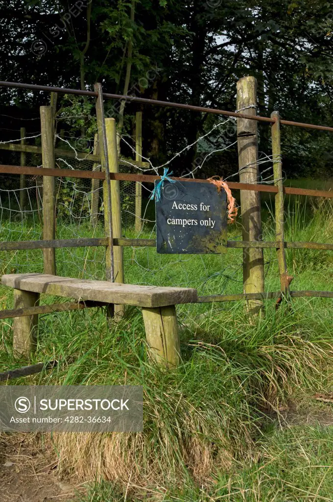 England, Cumbria, Bedale. Access for campers only sign next to stile.