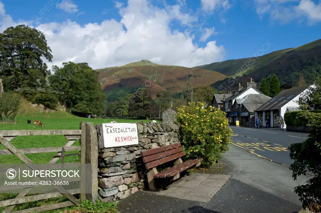 England, Cumbria, Grasmere. Sign on wall showing direction of Keswick and Easedale Tarn.