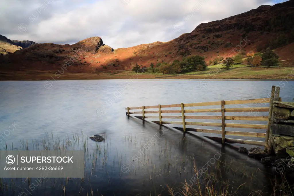 England, Cumbria, Blea Tarn. Stormy afternoon light at Blea Tarn in the Lake District.