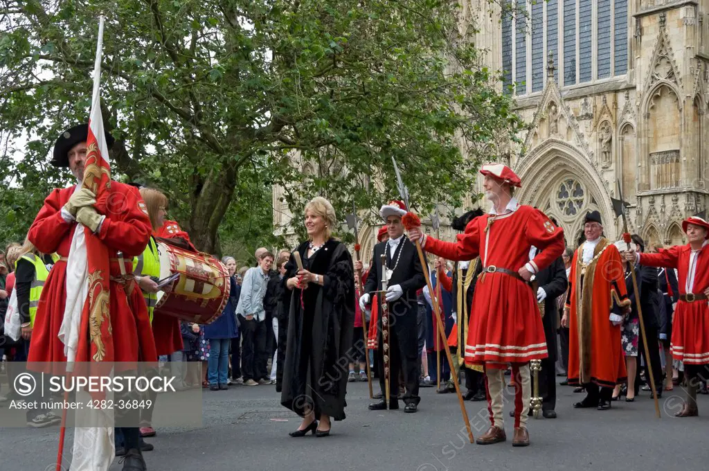 England, North Yorkshire, York. The York Waits outside the Minster to celebrate 800 years since York was granted a Royal Charter by King John in 1212.