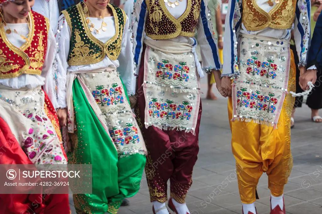 Bulgaria, Varna, Varna Folklore Festival. Four Turkish dancers in national costumes dancing a traditional Turkish dance during the Varna Folklore Festival.