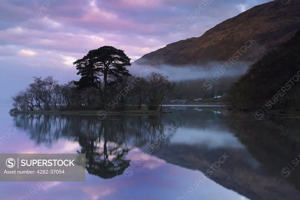 Scotland, Argyll and Bute, Oban. Dawn reflections on Loch Awe in Argyll and Bute.