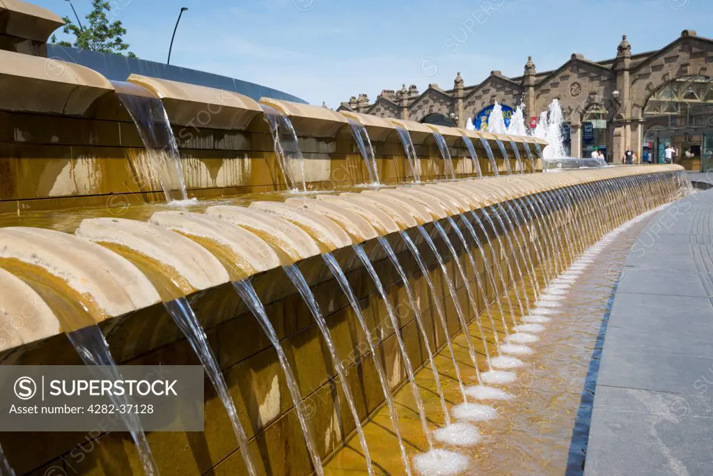 England, South Yorkshire, Sheffield. A view across the waterfalls in Sheaf Square in Sheffield.