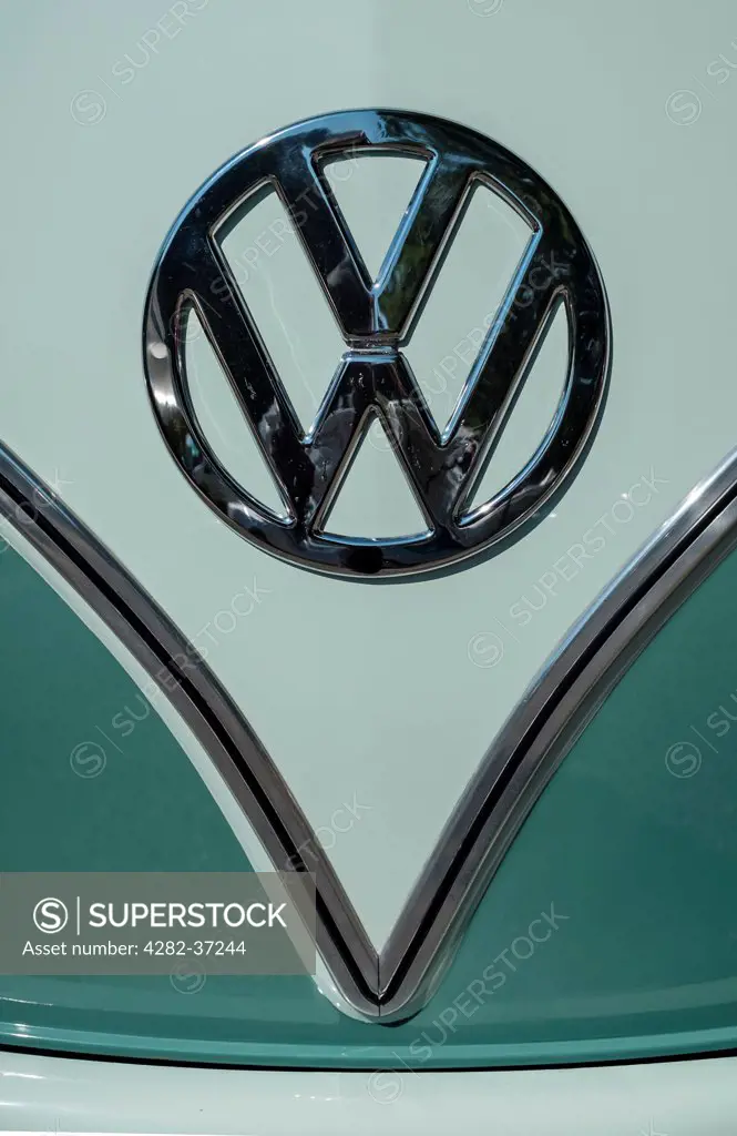 England, Norfolk, Holt. The Volkswagen logo on a vehicle at the Dubs At The Hall VW festival.