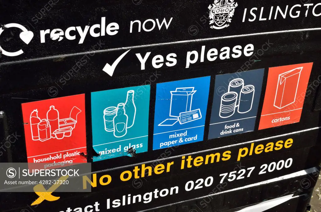 England, London, Islington. Close up of a recycling bin showing the types of materials which can be recycled.