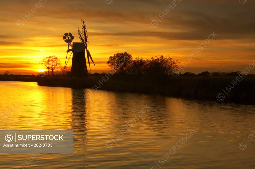 England, Norfolk , Turf Fen. Turf Fen windmill on the Norfolk Broads at sunset.