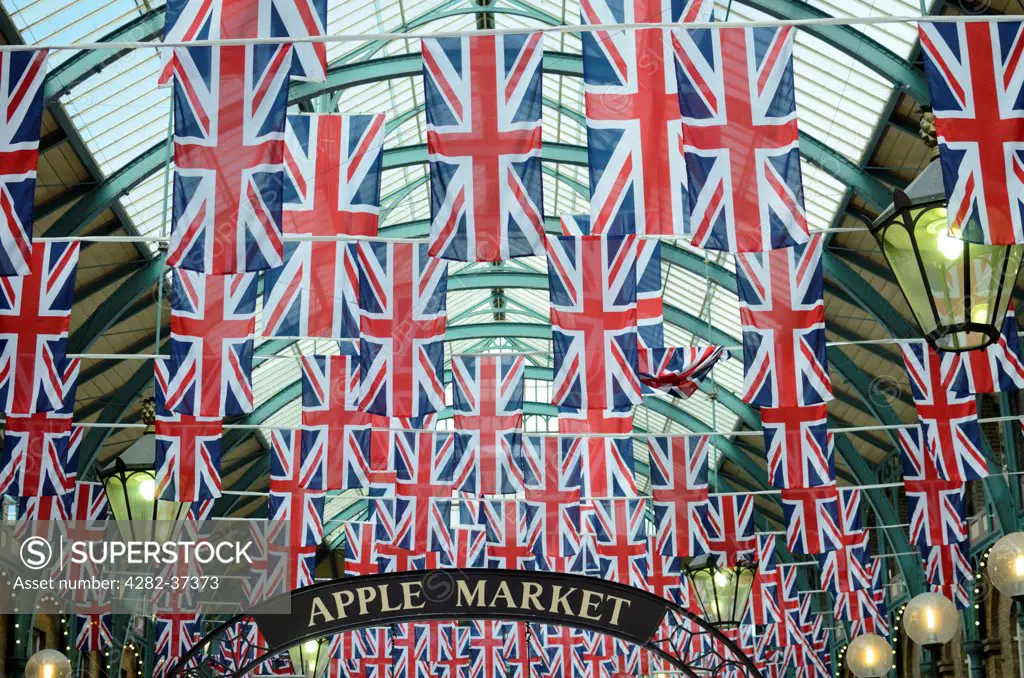 England, London, Covent Garden. Union Jack flags in the former Covent Garden Market building.