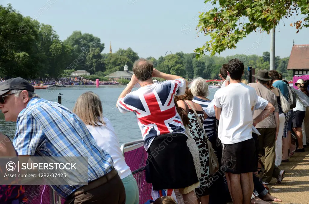 England, London, Hyde Park. Spectators watching a free 2012 Olympic swimming event.