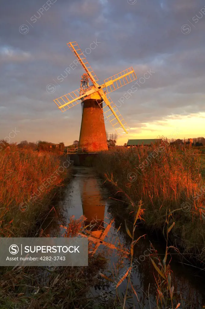 England, Norfolk, St. Benets Windmill. St. Benets Windmill at last light on the Norfolk Broads.