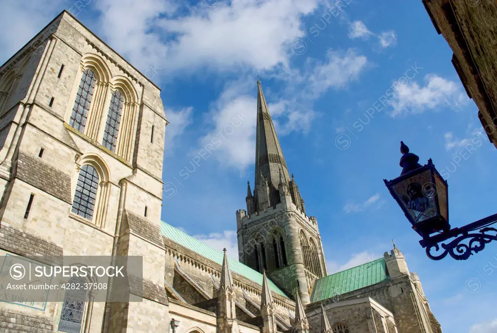 England, West Sussex, Chichester. A view of the spire and flying buttresses of Chichester Cathedral.