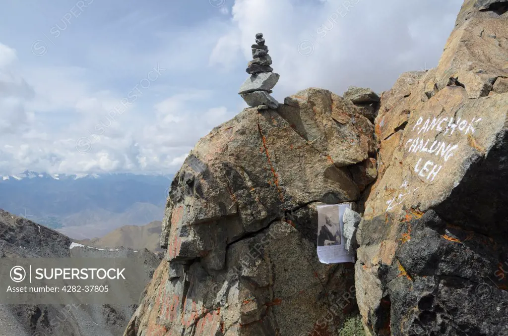 India, Jammu and Kashmir, Digar La pass. A cairn marks the top of Digar La pass at along with a tribute to Scottish explorer Isabella Bird who crossed the pass on a yak in 1889.