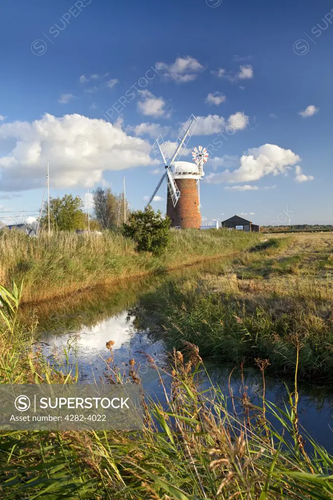 England, Norfolk, Horsey. Horsey windpump, a restored drainage mill on the Norfolk Broads.