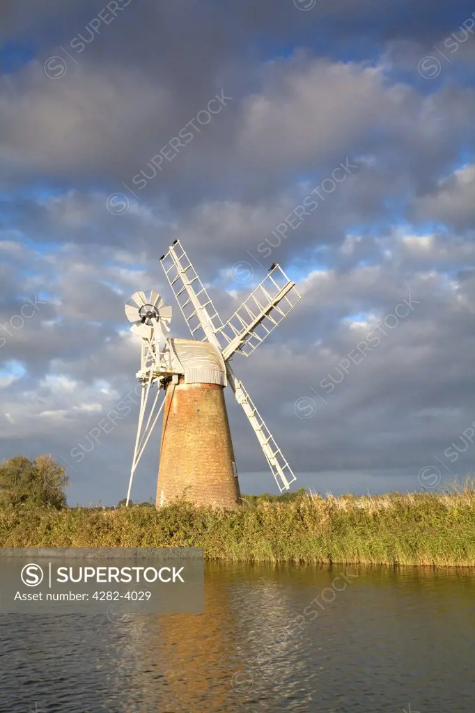 England, Norfolk, Near How Hill. Turf Fen drainage mill on the River Ant in the Norfolk Broads.
