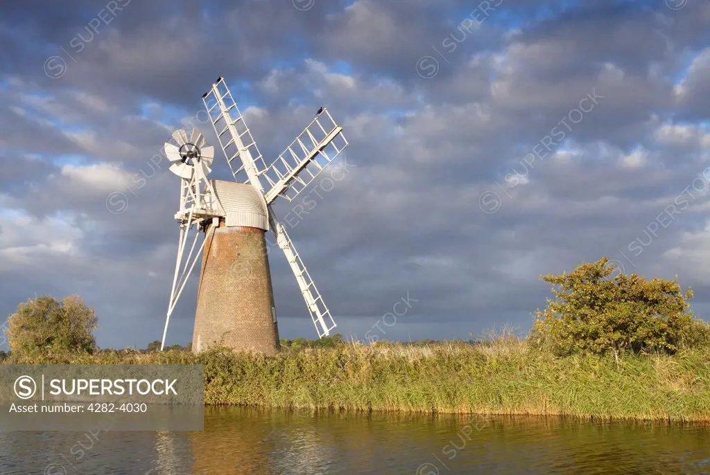 England, Norfolk, Near How Hill. Turf Fen drainage mill on the River Ant in the Norfolk Broads.