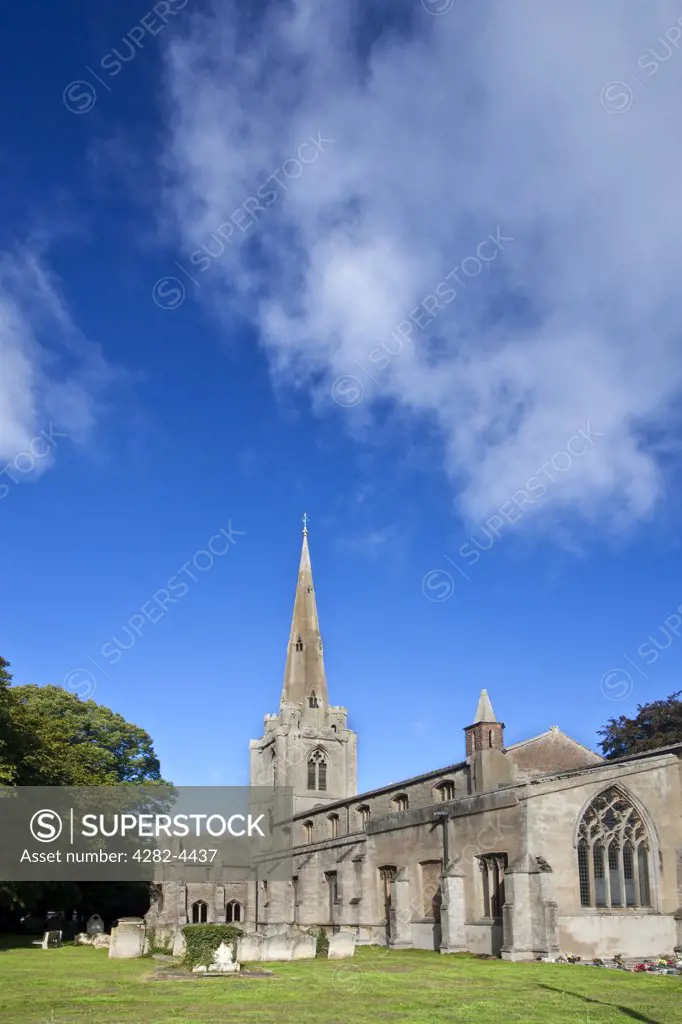 England, Cambridgeshire, Leverington. The church of St. Leonard in Leverington. The spire sits on top of a 13th century tower and rises to a height of 162 feet.