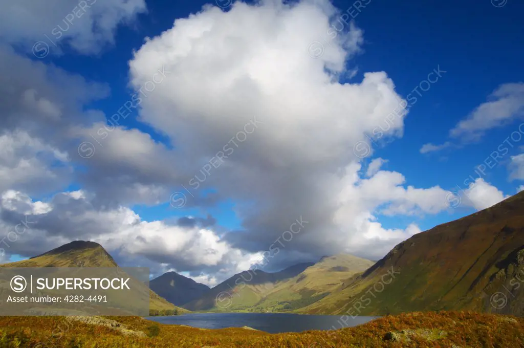 England, Cumbria, Wasdale. Wastwater in autumn in The Lake District National Park. Situated in the Wasdale Valley, Wastwater is 3 miles long, half a mile wide and 260 feet deep, and the deepest of all the lakes.