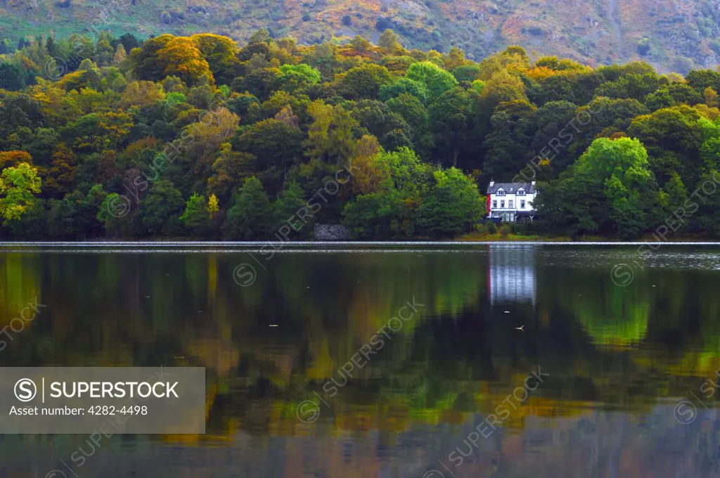 England, Cumbria, Grasmere. Early morning in autumn at Grasmere in The Lake District. Grasmere is a traditional settlement in the mountainous Lake District environment.