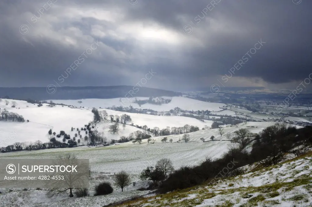 England, Gloucestershire, Stonehouse. Snowfall in the Cotswold Hills at Haresfield Beacon. The Cotswolds is one of 41 Areas of Outstanding Natural Beauty in England and Wales and is the largest, covering 790 sq. miles - 2,038 sq. kms.