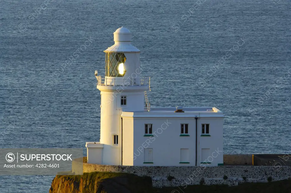 England, Devon, Hartland. A view of Hartland Point Lighthouse. Hartland Point Lighthouse built in 1874, gives a guide to vessels approaching the Bristol Channel.