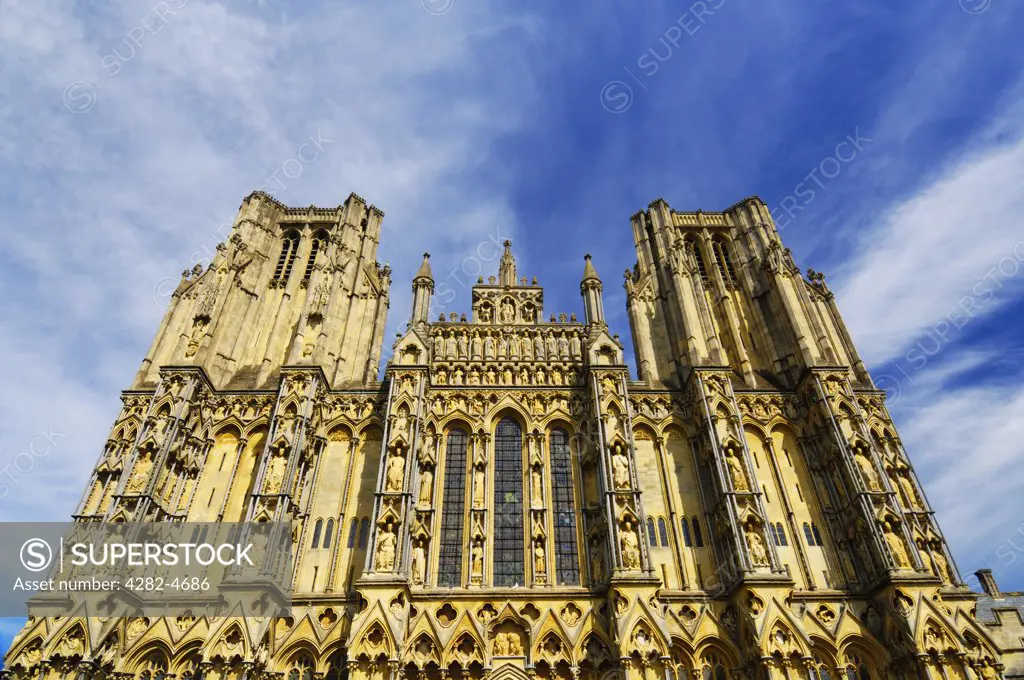 England, Somerset, Wells. The West front of Wells Cathedral. The smallest city in England, Wells derived it's name from the natural wells that supply water to the area from the nearby Mendip Hills.