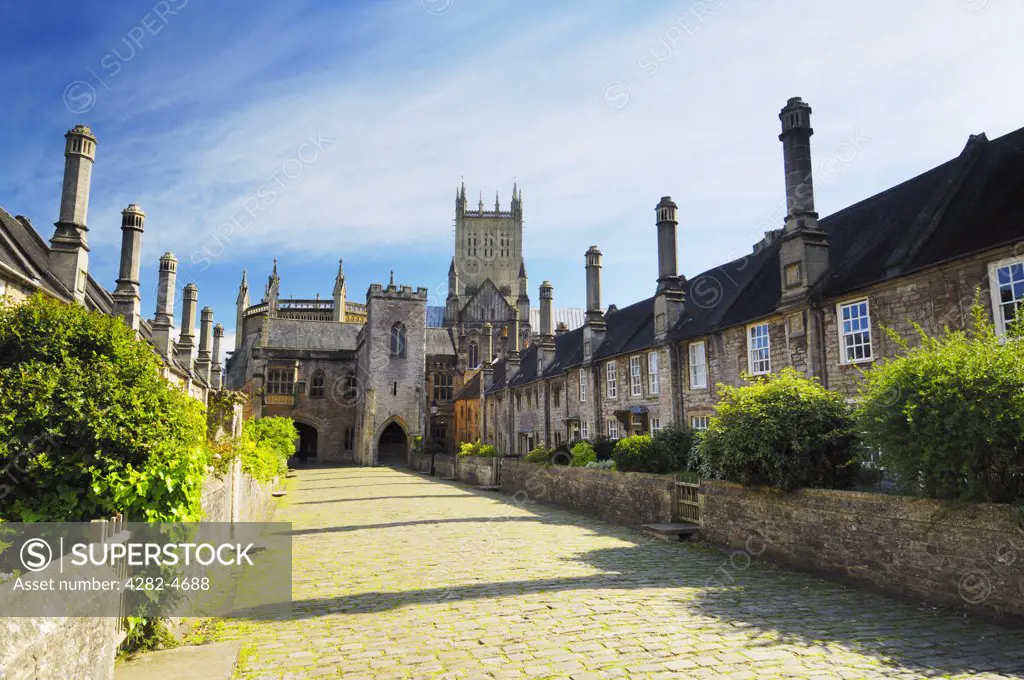 England, Somerset, Wells. Wells Cathedral viewed from Vicars Close. Thought to be the oldest planned street in Europe, the close and the cottages were built to house the Vicar's Choral.