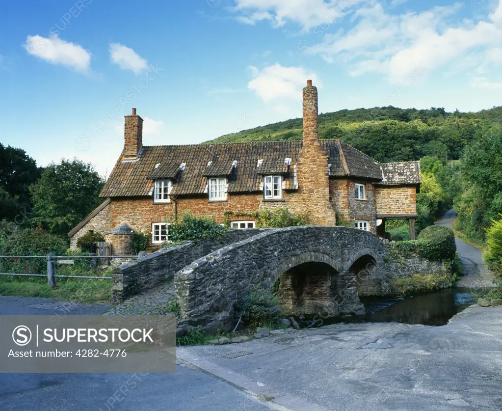 England, Somerset, Allerford. The old packhorse bridge in the village of Allerford in Exmoor National Park.