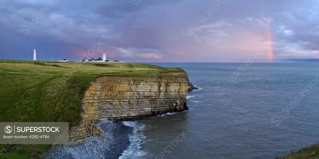 Wales, Glamorgan, Marcross. A view toward the two lighthouses at Nash Point on the Glamorgan Heritage Coast.