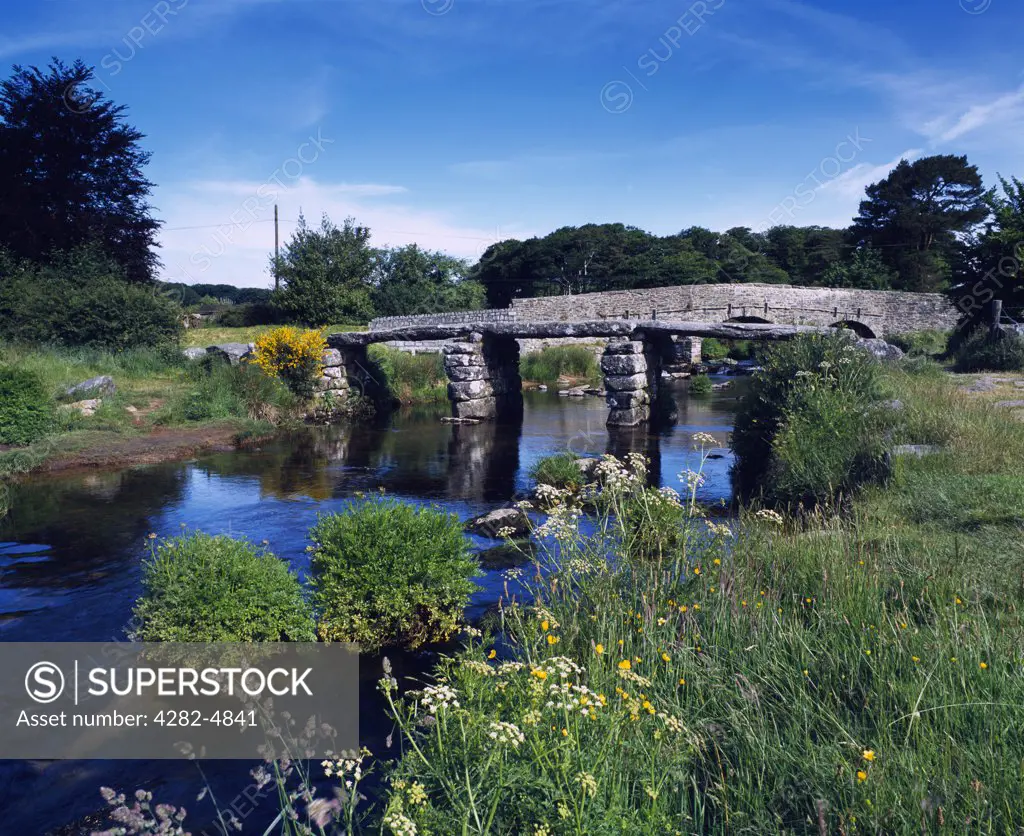 England, Devon, Postbridge. The old clapper bridge over the East Dart River at Postbridge in Dartmoor National Park.