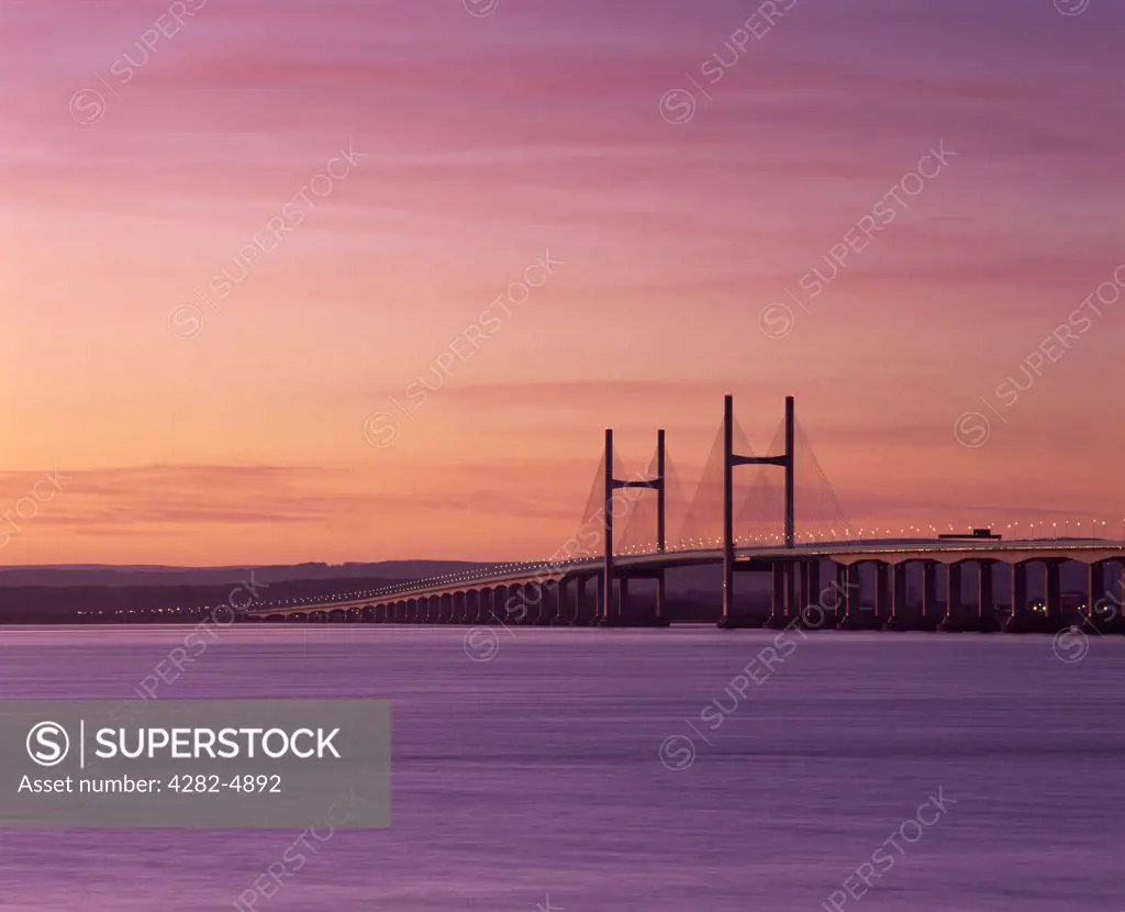 England, Gloucestershire, Severn Beach. A dusk view of the Second Severn Crossing over the River Severn between England and Wales seen from Severn Beach.