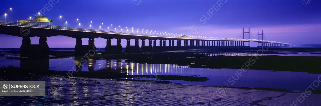 England, Gloucestershire, Redwick. The Second Severn Crossing over the River Severn between England and Wales seen from Redwick at night.