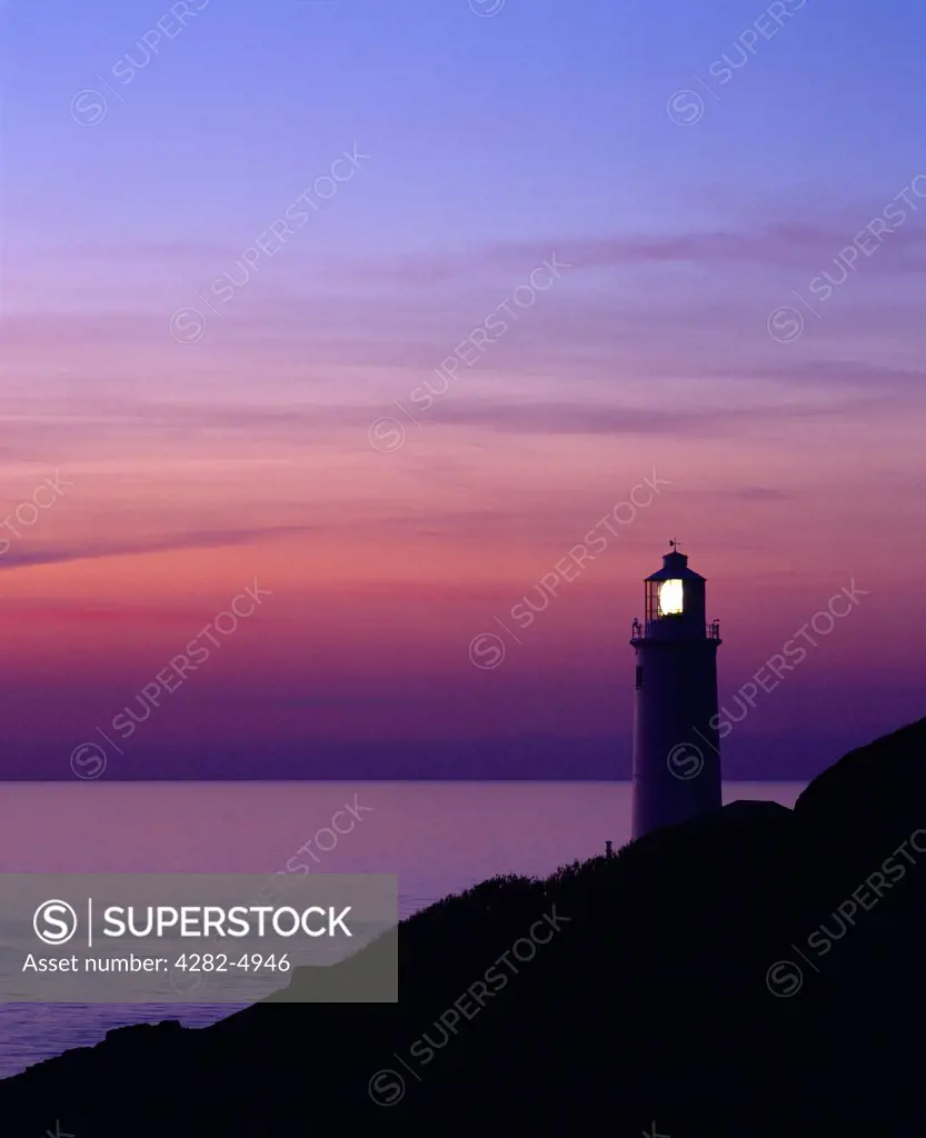England, Cornwall, Trevose Head. Silhouette of the lighthouse at Trevose Head at dusk on the North Cornwall coast near Padstow.
