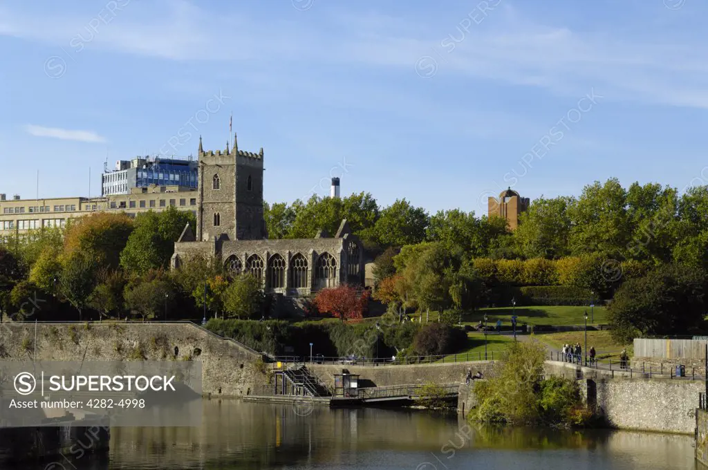 England, Bristol, Bristol. The ruin of St Peter's Church in Castle Park overlooking the Floating Harbour.