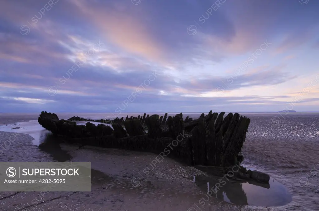England, Somerset, Berrow. The wreck of the Nineteenth Century Norwegian barque SS Nornen which ran aground in 1897 at Berrow Flats in Somerset.