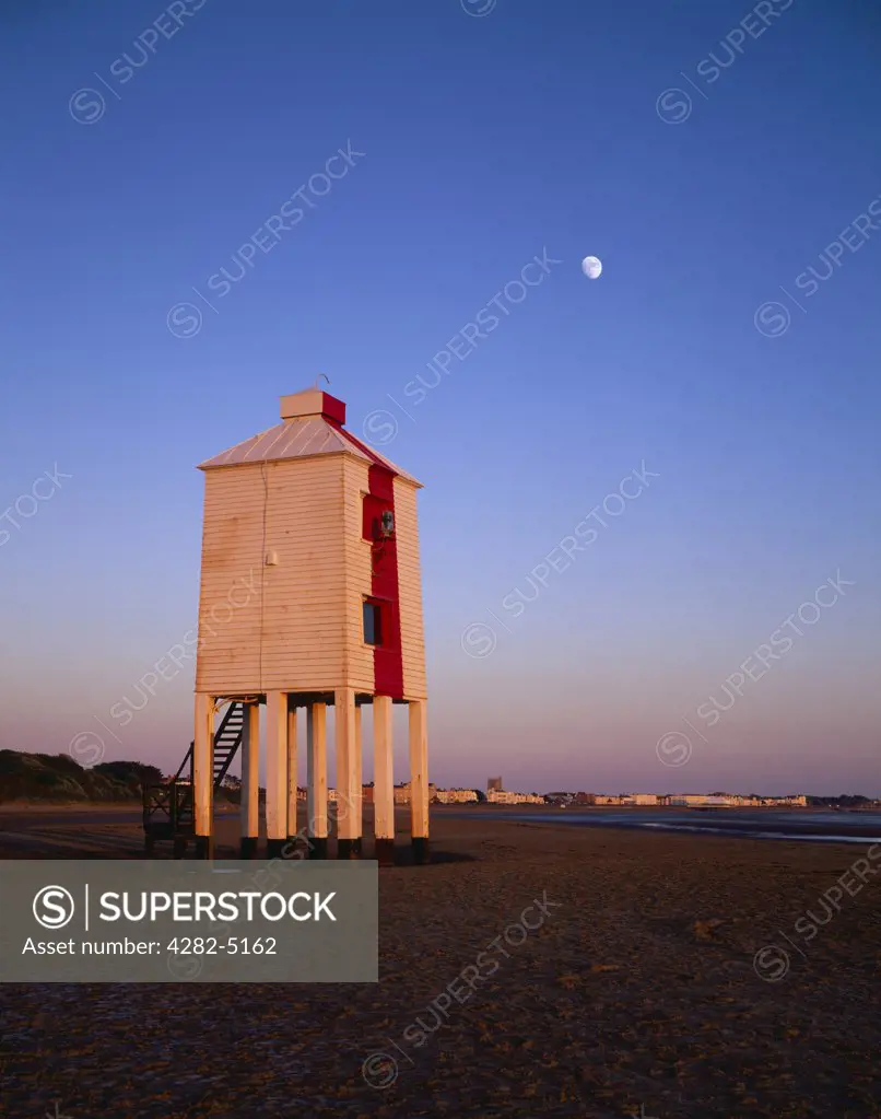England, Somerset, Burnham-on-Sea. The lighthouse on legs overlooking Bridgwater Bay in the Bristol Channel at Burnham-on-Sea with the Moon overhead.