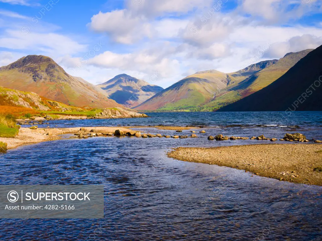 England, Cumbria, Nether Wasdale. View over Wastwater, England's deepest lake, of Yewbarrow, Great Gable, Lingmell and Scafell fells at Wasdale Head in the Lake District National Park.