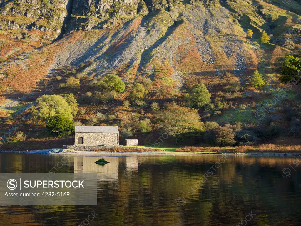England, Cumbria, Nether Wasdale. The pumping station on the shore of Wastwater, England's deepest lake, by The Screes in the Lake District National Park.
