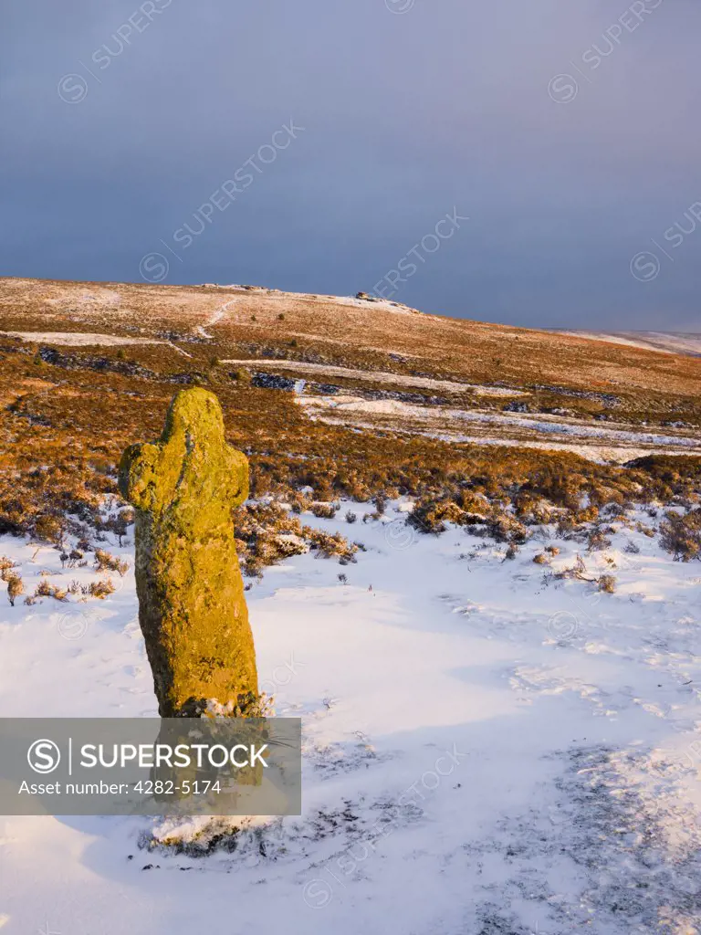 England, Devon, Postbridge. Bennetts Cross in winter snow in Dartmoor National Park near Postbridge.