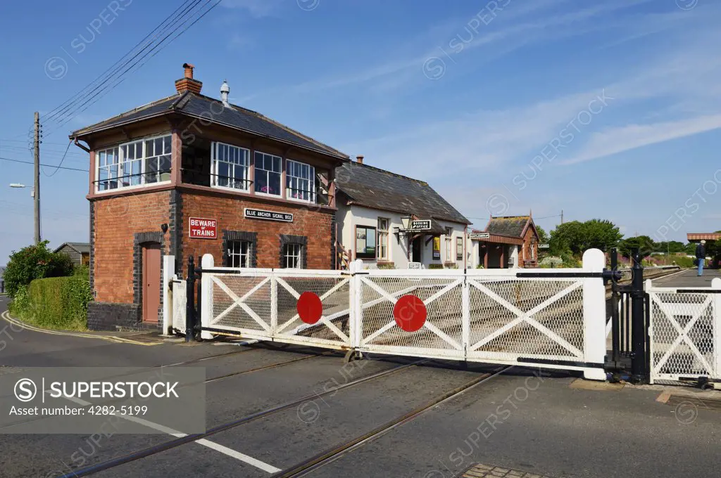 England, Somerset, Blue Anchor. The level crossing and signal box at Blue Anchor on the West Somerset Railway.