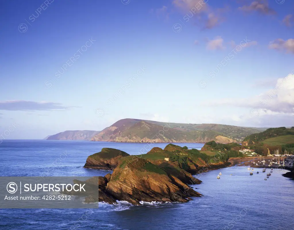 England, Devon, Watermouth. Sextons Burrow and Watermouth near Combe Martin viewed from Widmouth Head. The cliffs of Exmoor can be seen in the distance.