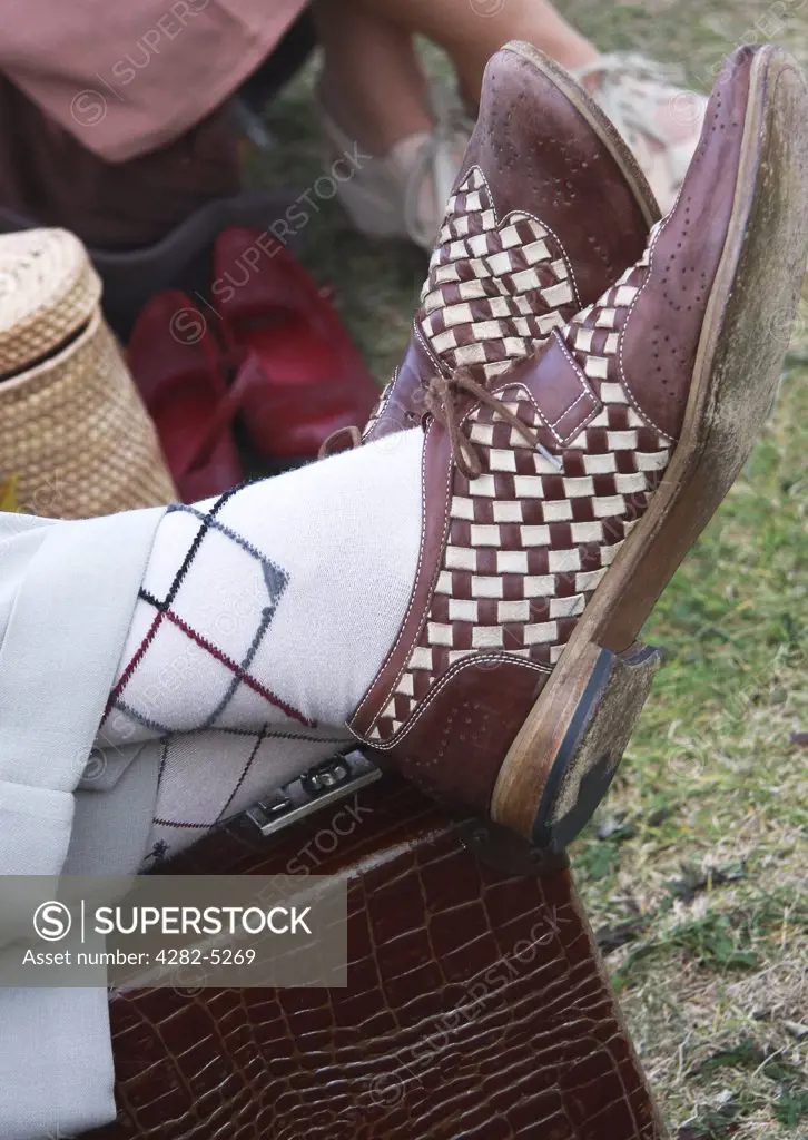 England, West Sussex, Goodwood Revival. Retro shoes and socks at Goodwood Revival.