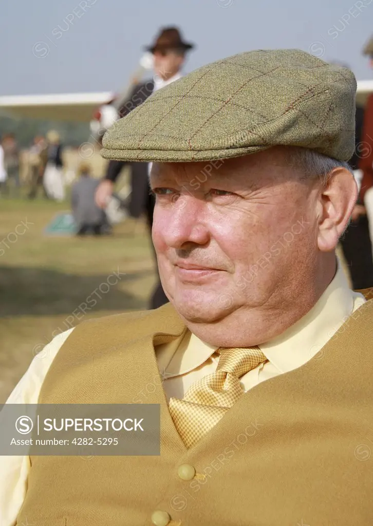 England, West Sussex, Goodwood Revival. Spectator at Goodwood Revival.