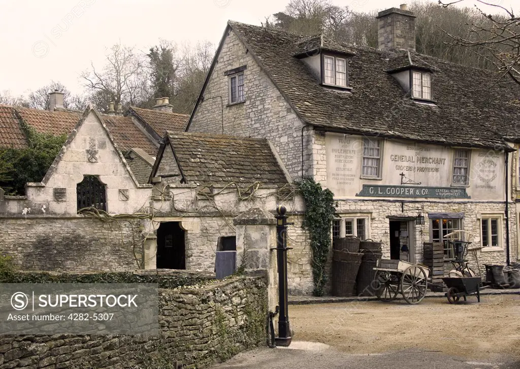 England, Wiltshire, Castle Combe. A view towards the front of the General Store in Castle Combe.