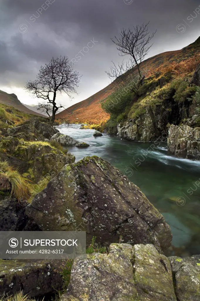 England, Cumbria, Brotherilkeld. A view of the River Esk near Brotherilkeld. The River Esk begins in Great Moss below Scafell Pike in the English Lake District and flows down to the sea at Ravenglass.