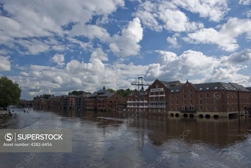 England, North Yorkshire, York. A view of York city when the River Ouse rose to flood parts of the river bank.