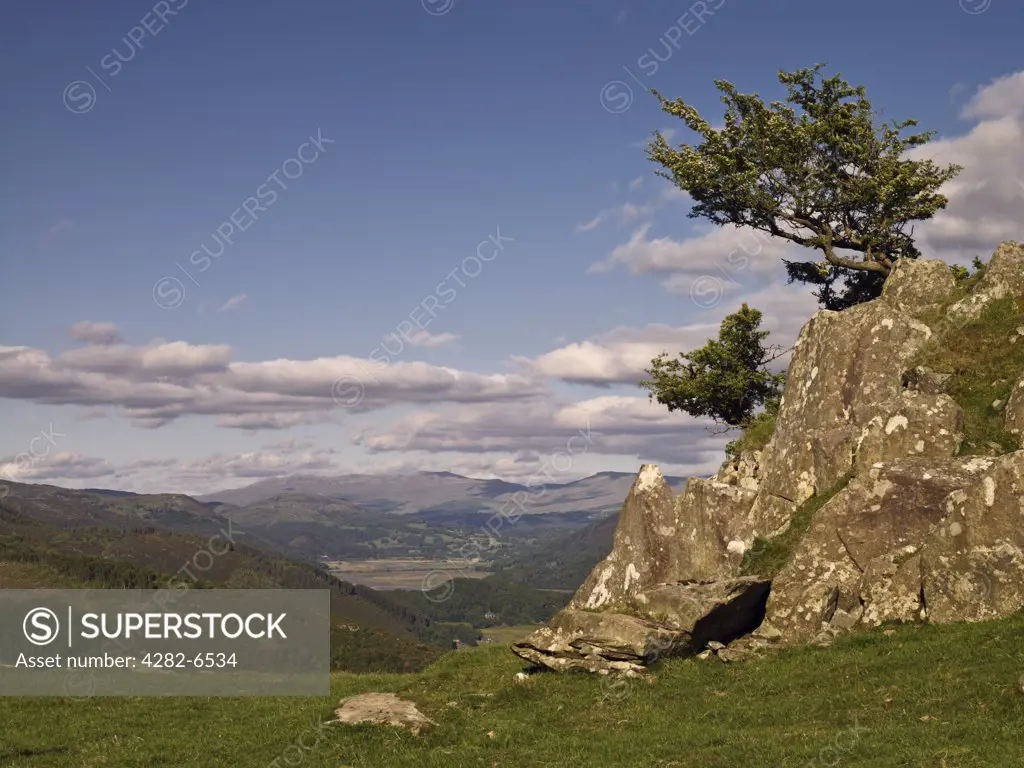 Wales, Gwynedd, near Barmouth. View over countryside towards mountains in the Snowdonia National Park.